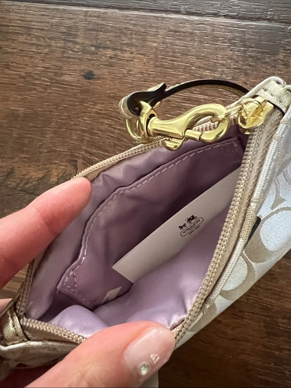 Coach Beige Signature Wristlet with Gold Patch